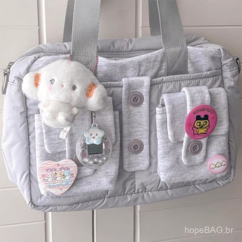 Bolsa transversal casual de marca coreana com design exclusivo, 3 cores, com bolso e botão.