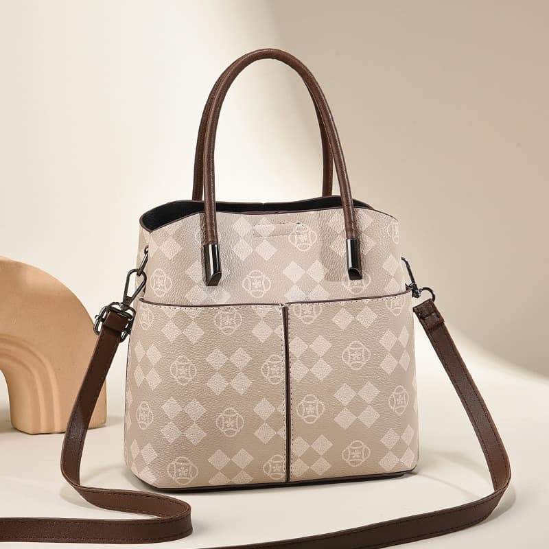 Hong Kong bolsa de couro genuíno feminino 2026 novo estilo moda na moda bolsa mãe de meia-idade grande capacidade All-Ma