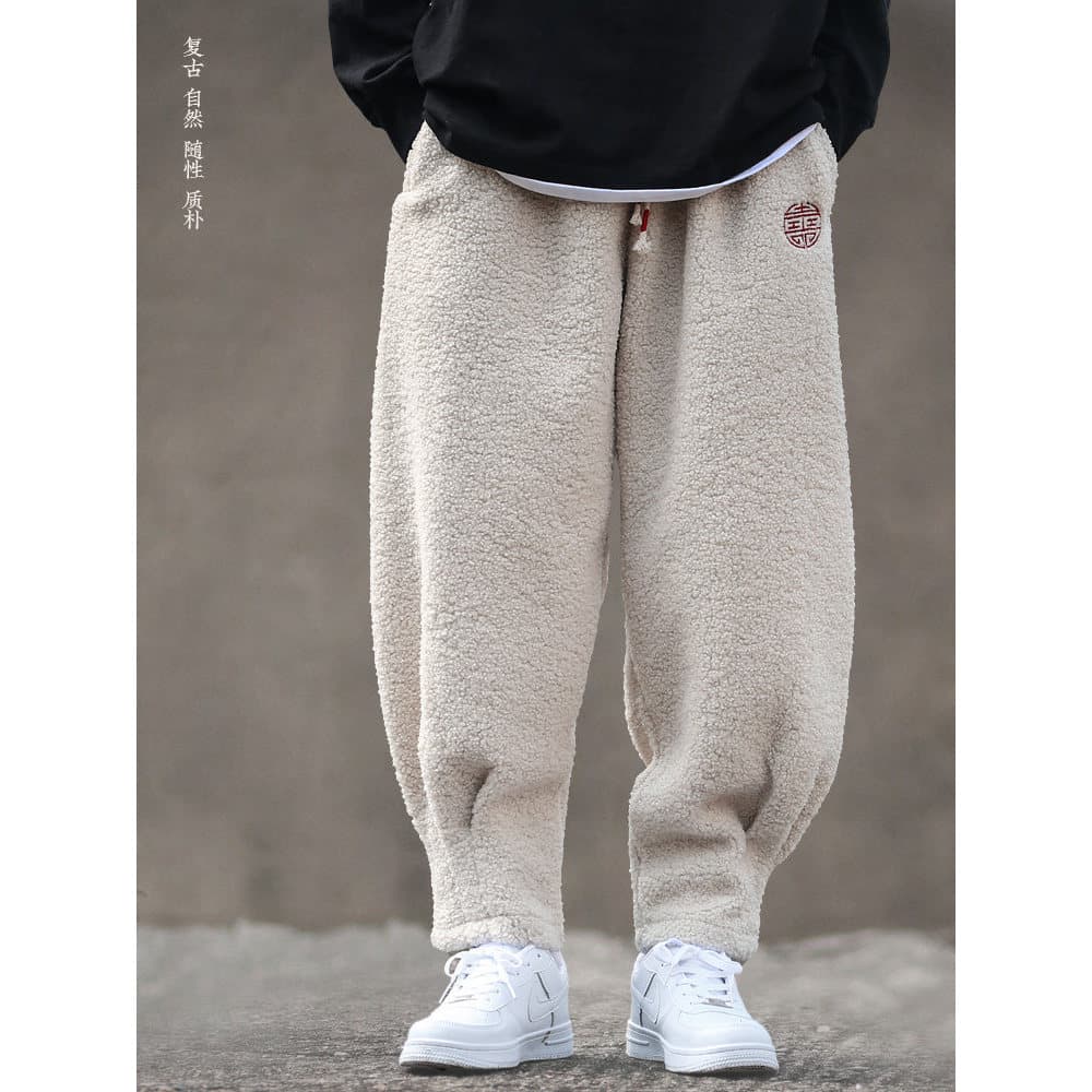 Estilo chinês forro de inverno engrossado calças de lã de cordeiro masculino exterior usar calças compridas soltas quent