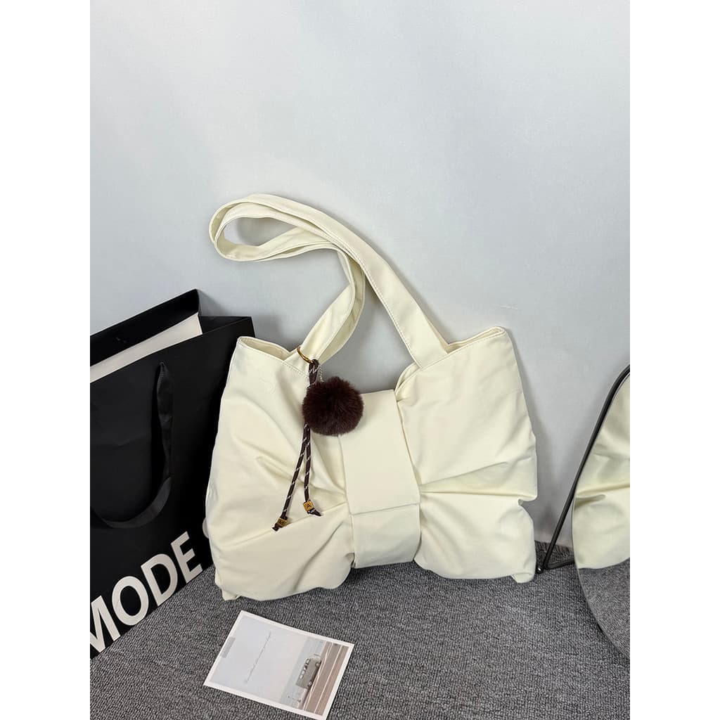Moda versão coreana novo estilo arco simples saco 2025 saco do mensageiro grande capacidade Commuter axila pedido ombro