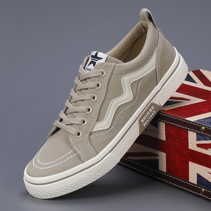 Primavera novo estilo sapatos masculinos versão coreana respirável sapatos casuais na moda All-Match sapatos de lona pla