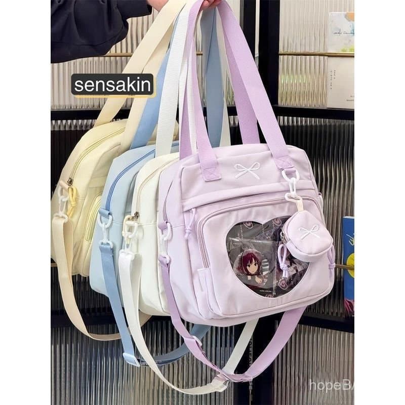 Ita Bag é uma bolsa transversal versátil, transparente e charmosa, de estilo japonês, para estudantes femininas, adequad