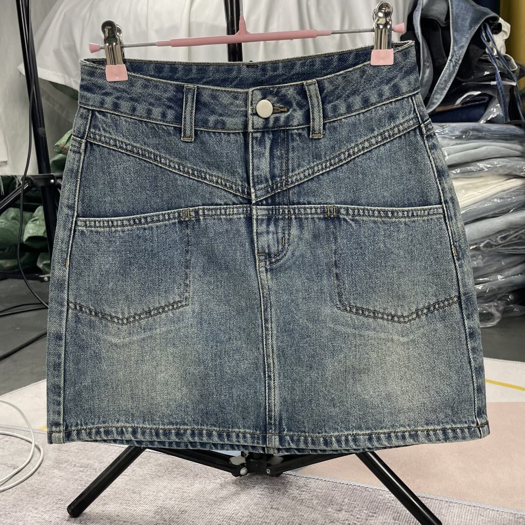 Retro azul quente menina cintura alta Denim saia feminina 2026 verão novo estilo pequeno mais magro olhar a linha Hip sa
