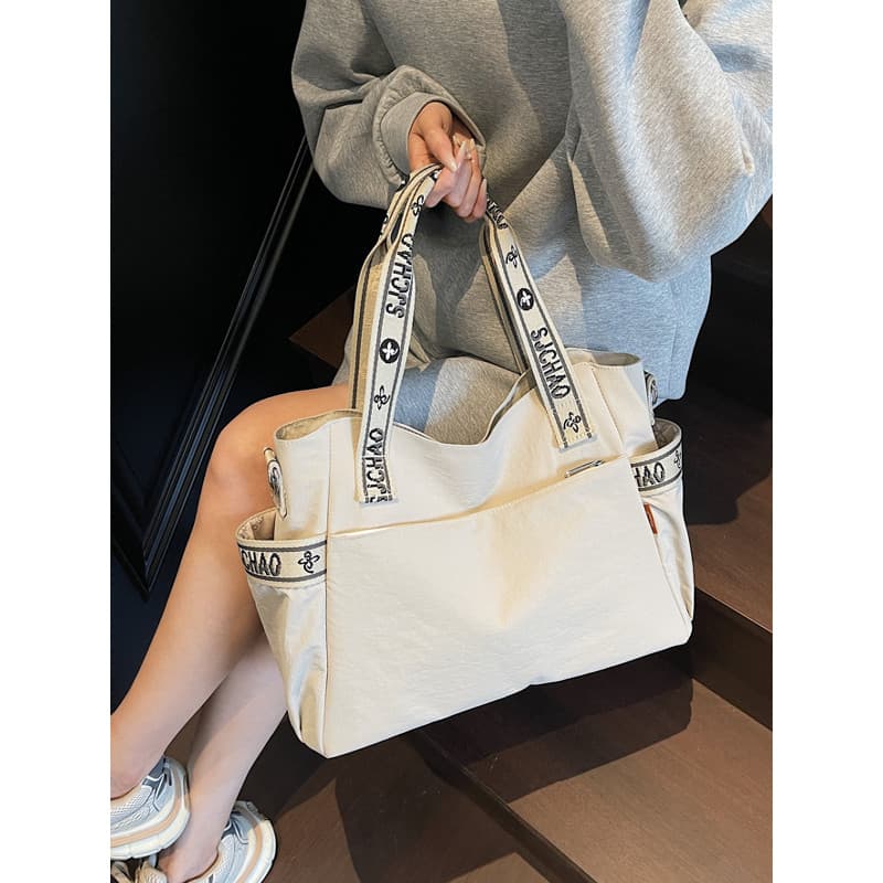 Senhoras Outing bolsa de viagem moda grande capacidade leve portátil ombro mensageiro saco estudante classe lona sacola