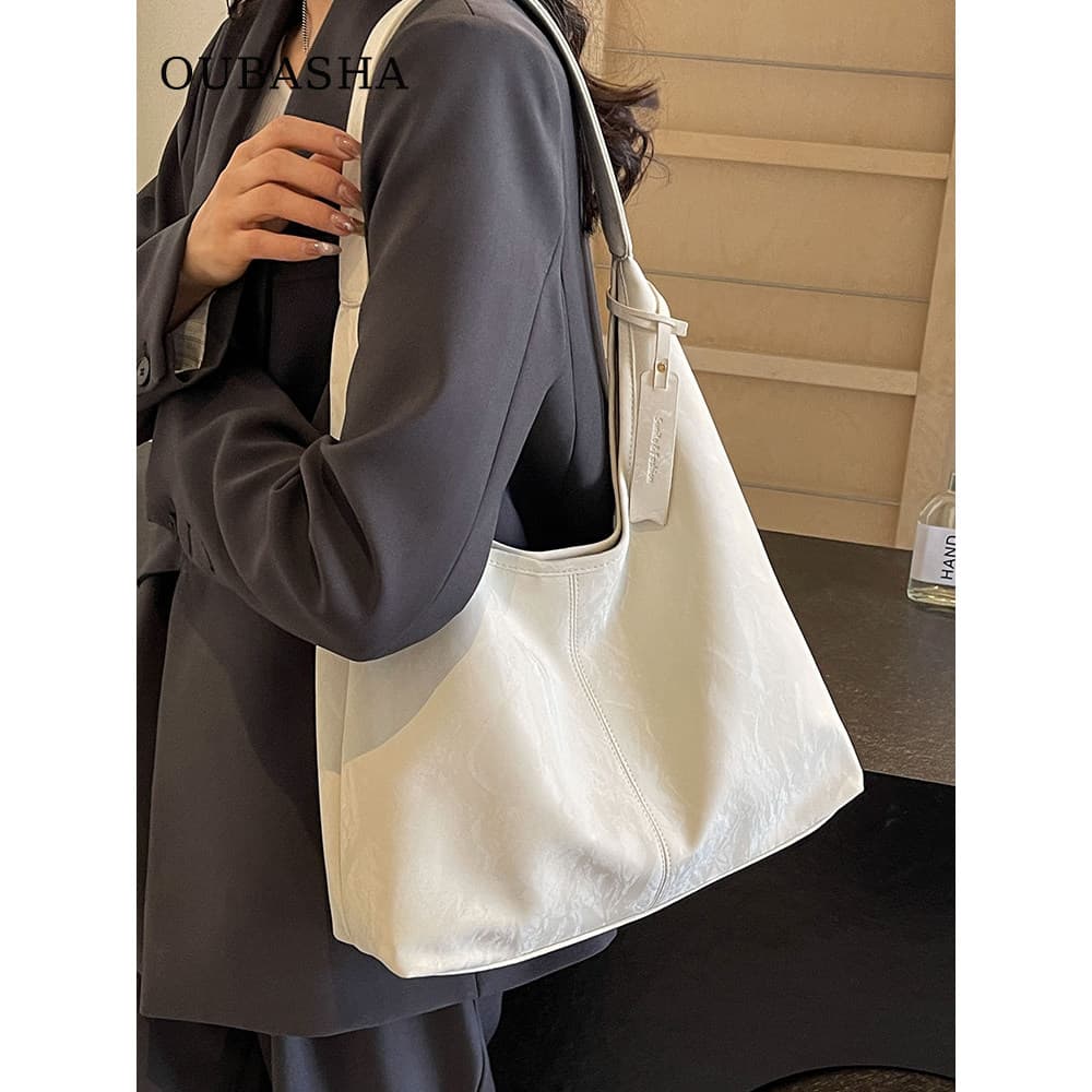 Bolsa de grande capacidade feminina 2026 novo estilo verão Super quente luz luxo nicho bolsa de ombro High-End Commuter