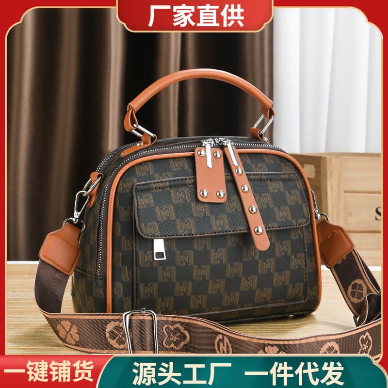 Bolsa pequena portátil 2025 moda feminina impressa pequena bolsa redonda europeia americana Retro elegante carta bolsa d