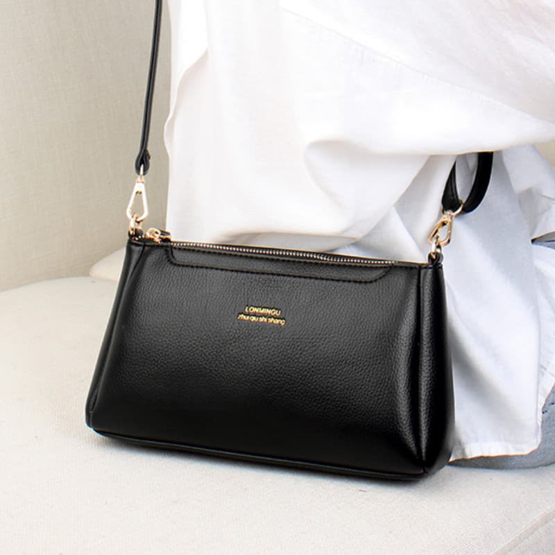 Bolsa feminina de couro genuíno 2025 novo estilo bolsa mensageiro textura couro macio mãe de meia-idade grande capacidad
