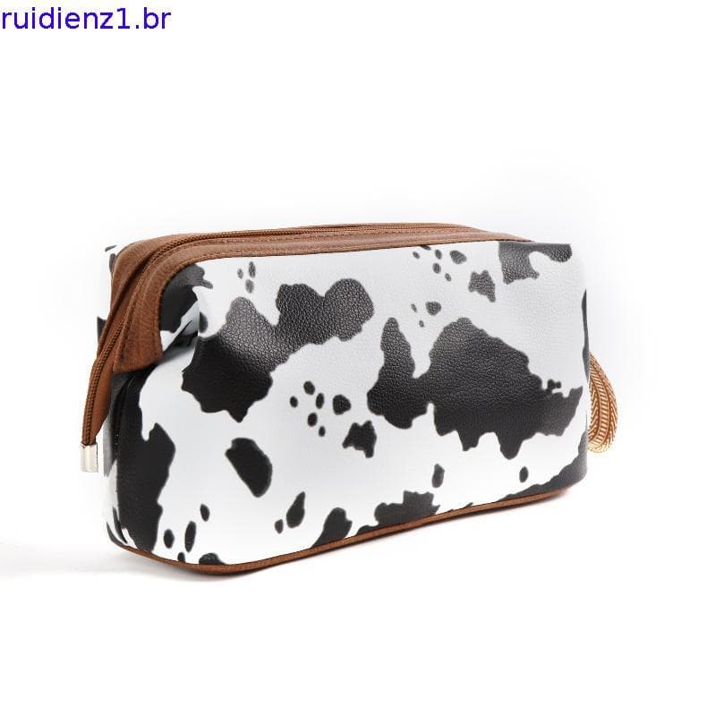 2026 Bolsa cosmética com padrão de vaca de grande capacidade de alto valor Embreagem Retro Fashion Nicho Fashion
