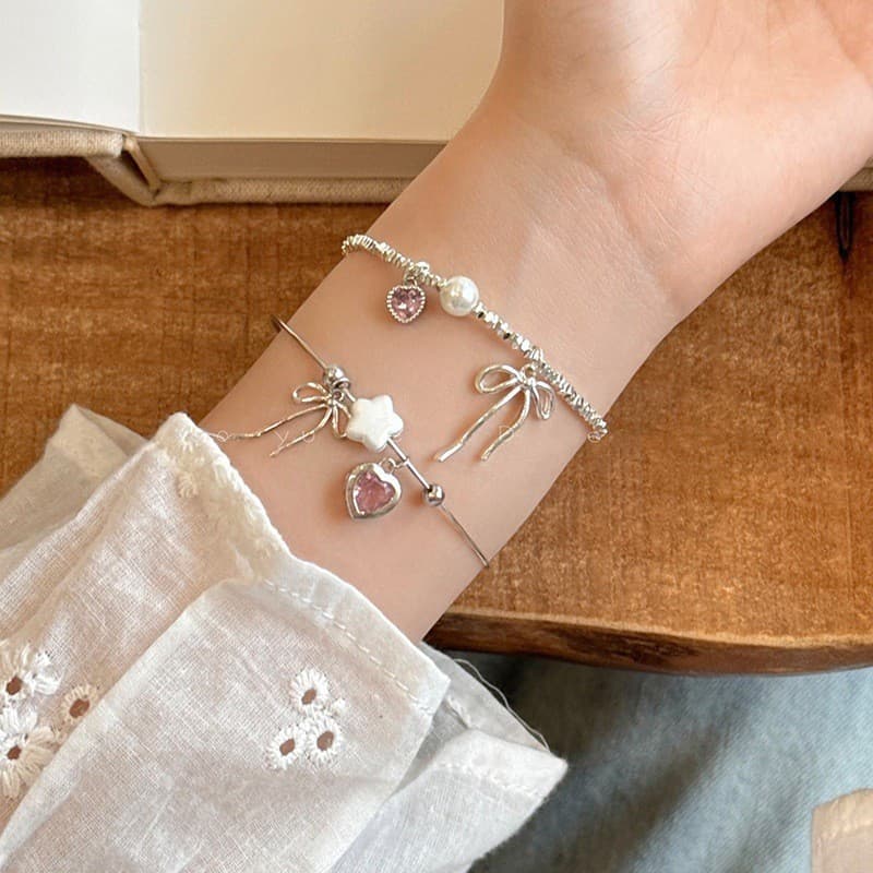 [Estoque pronto] Rosa amor coração arco quebrado pulseira de prata feminina luz luxo requintado pulseira novo estilo doc