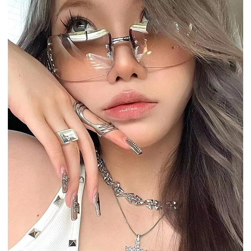 Óculos de sol feminino Anti-ultravioleta 2022 novo estilo sem moldura diamante-luz forte