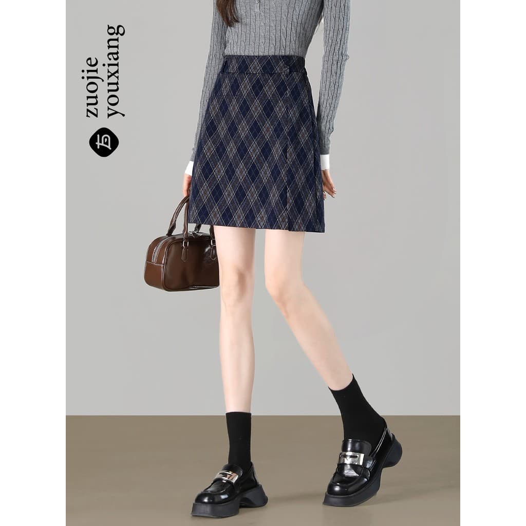 A linha saia feminina 2026 novo estilo outono inverno feminino cintura alta mais magro olhar simples Commuter lã Hip-emb