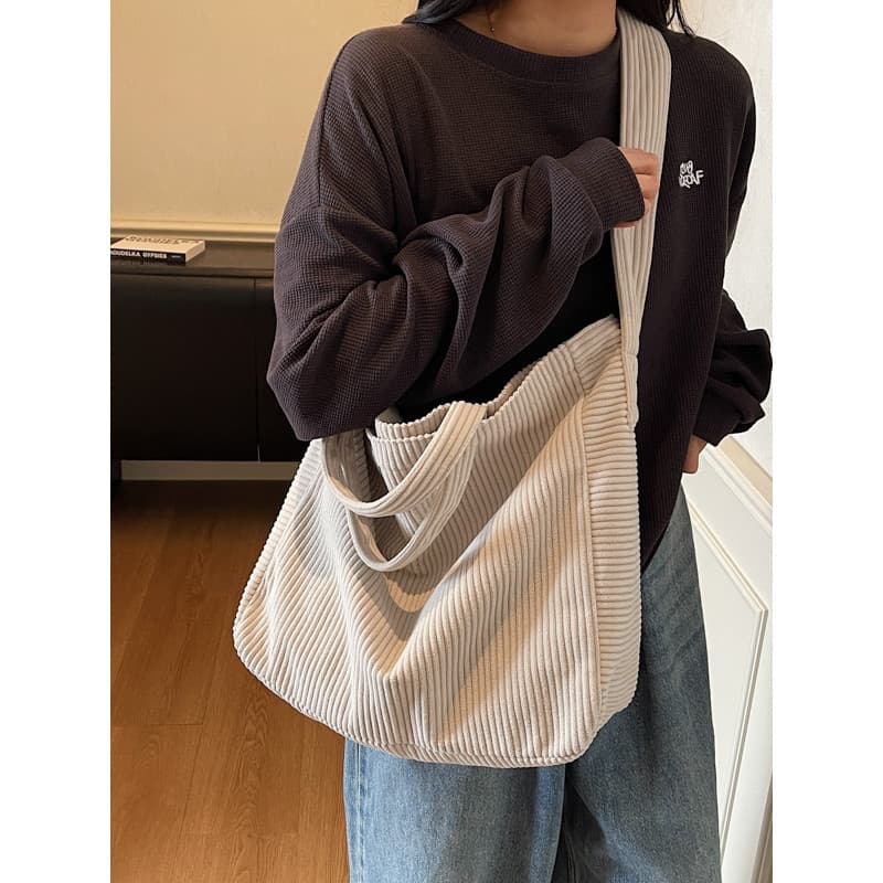 Moda simples listrado veludo saco feminino 2025 novo estilo preguiçoso veludo Commuter saco grande capacidade Cross-body