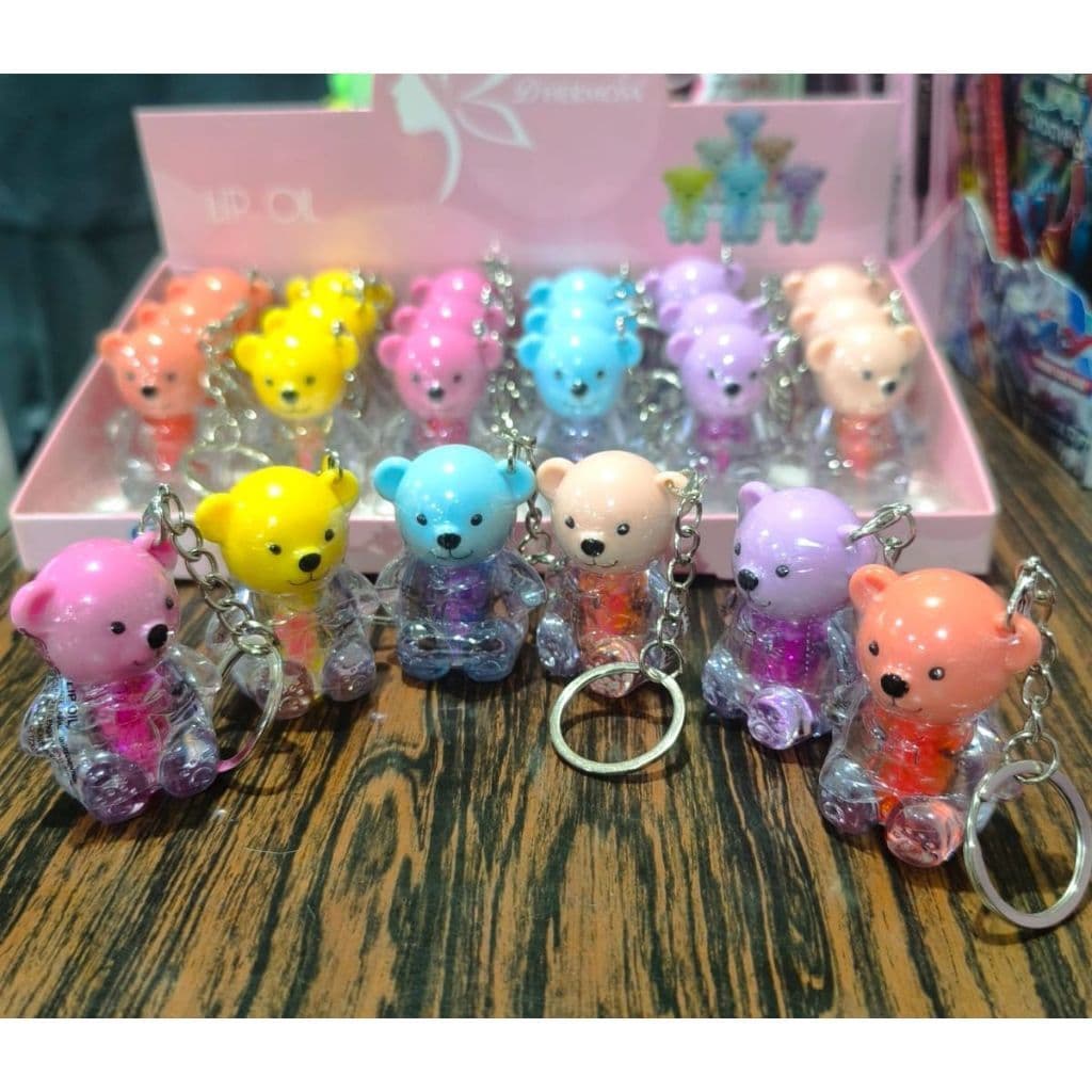 Kit com 12 Peças de Lip Gloss Chaveirinho Com Glitter Teddy Urso - D'Hermosa