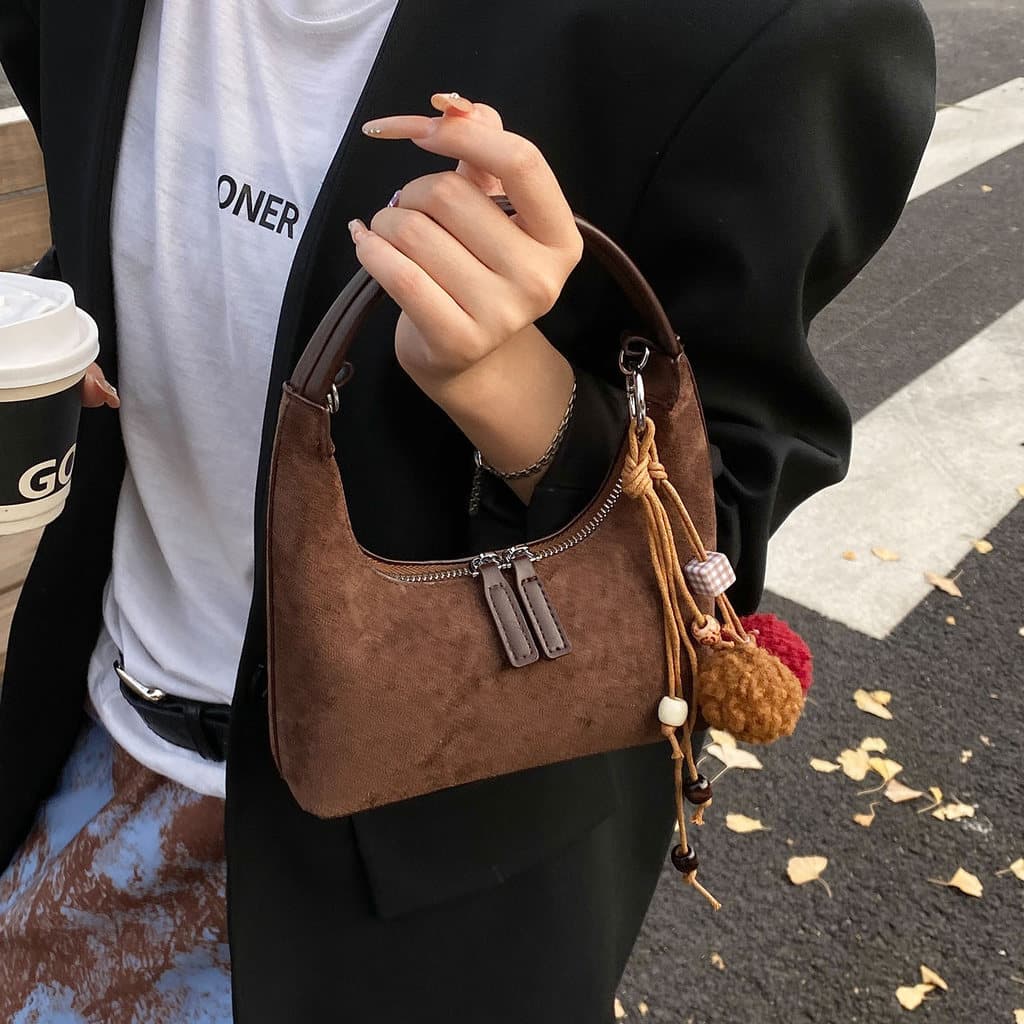 Outono inverno novo estilo All-Match temperamento bolinho saco 2025 nicho feminino Design versão coreana ins portátil bo