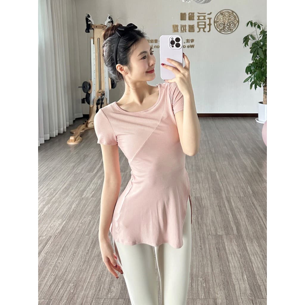 Yoga topo feminino novo estilo correndo de manga curta esportes camiseta estilo longo Hip-cobrindo mais magro olhar tern