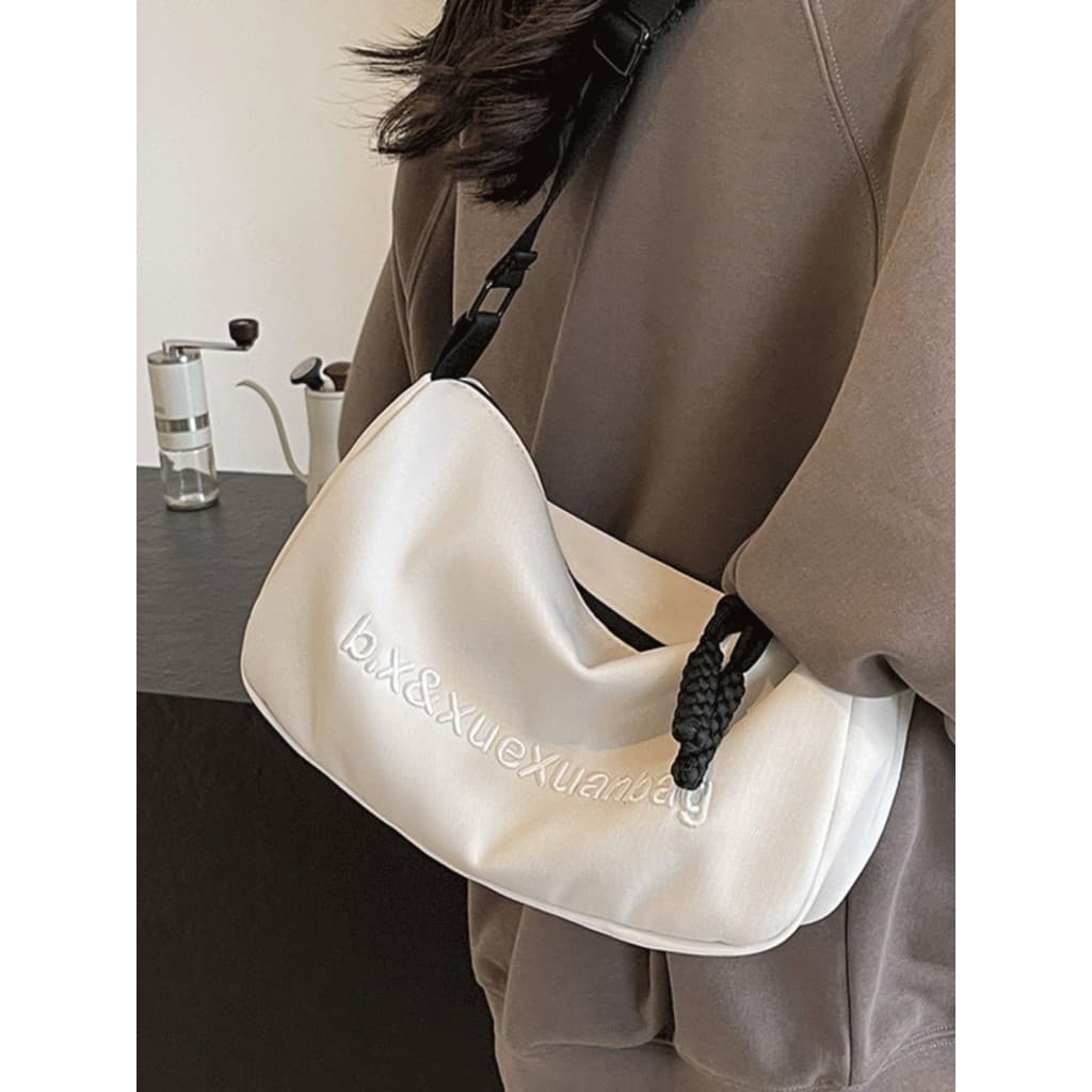 Casual All-Match saco do mensageiro feminino 2026 novo estilo moda esportes bolsa de ombro nicho Design simples axilas s