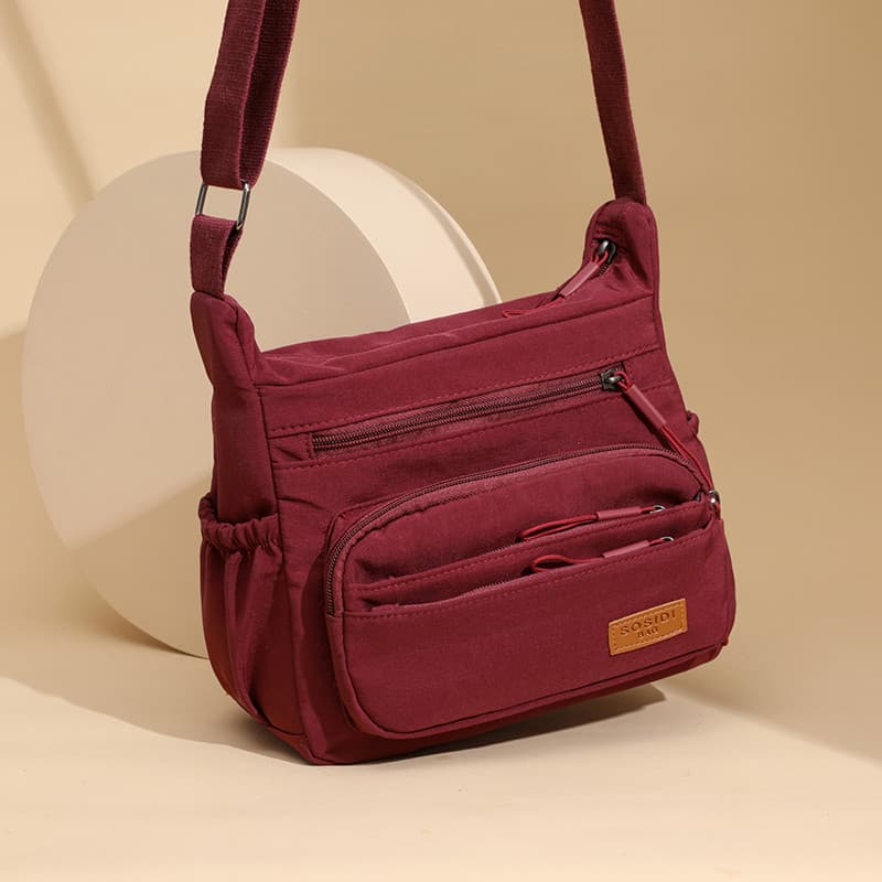 Robo coelho bolsa de ombro feminina 2026 novo estilo grande capacidade Multi-camada saco do mensageiro Commuter mãe de m