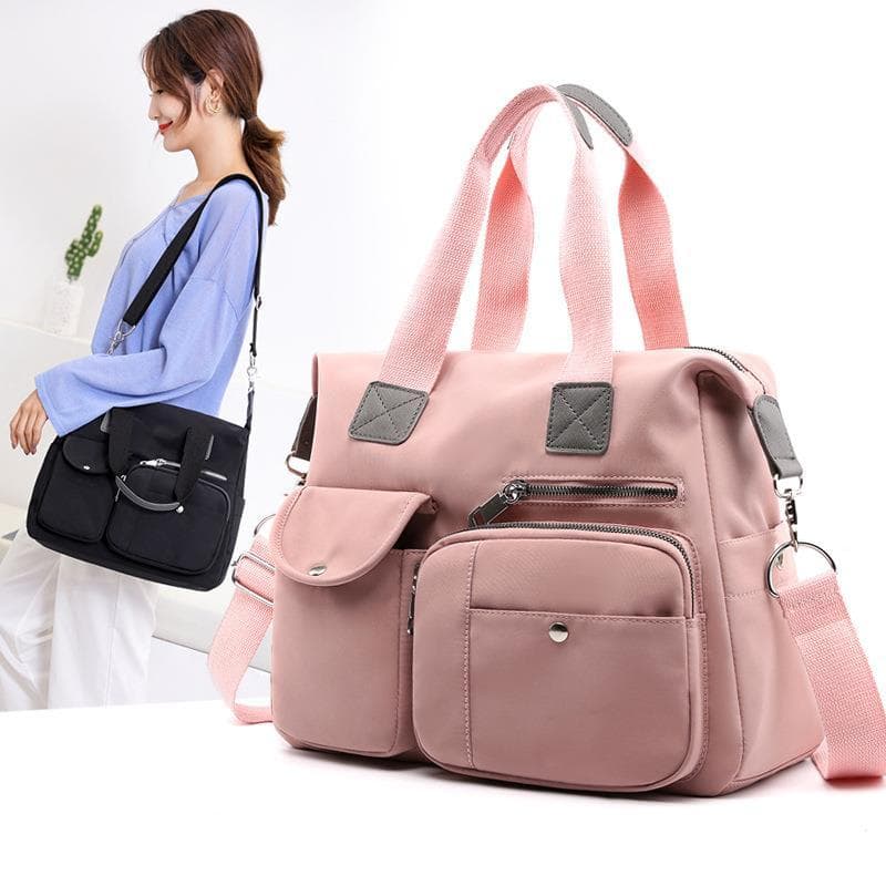 2027 bolsa de ombro feminina europeia americana bolsa de ombro bolsa de mamãe de Nylon portátil de viagem de