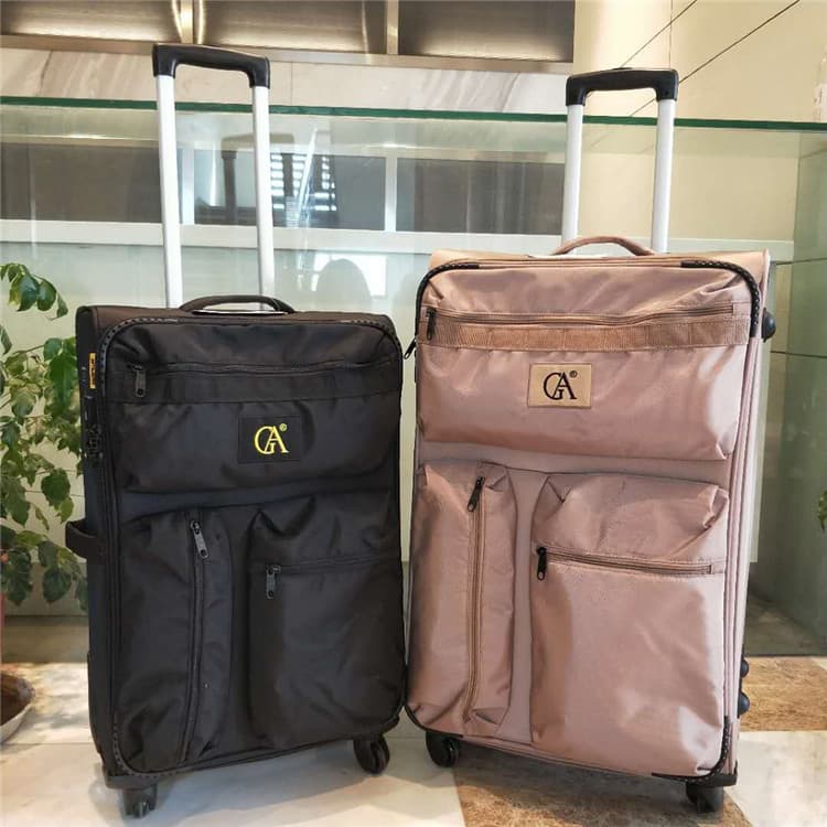 Grande capacidade de embarque 67cm Oxford pano trole caso Ultra-leve lona mala 93cm bagagem verificado roda Universal