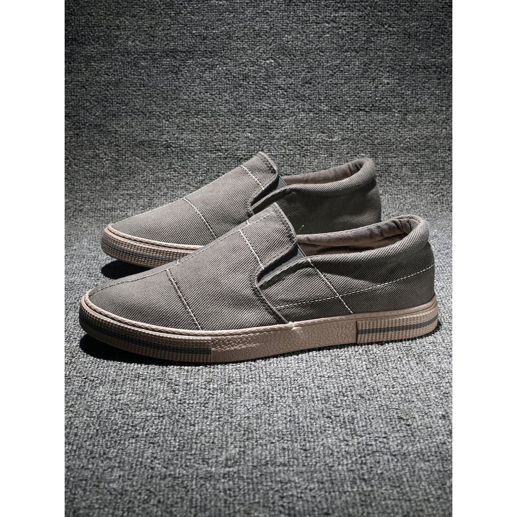 Sapatos de lona masculinos deslizamento-On juventude respirável tênis casuais 2026 novo estilo sapatos masculinos primav