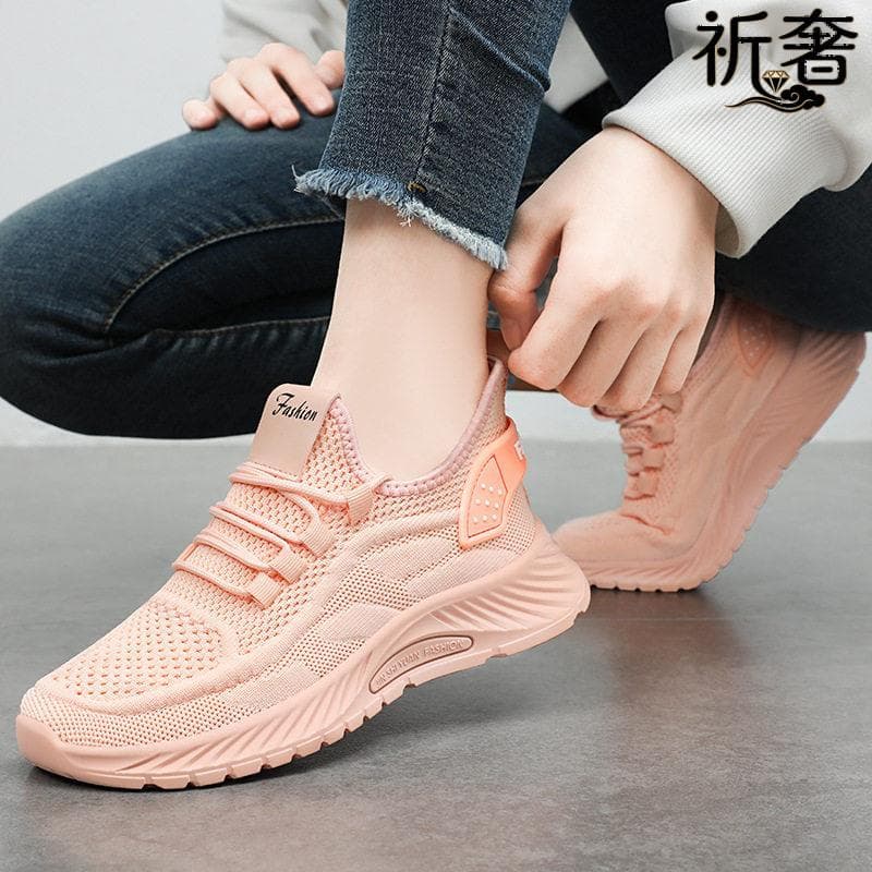 Tênis de coco feminino 2025 novo estilo primavera verão voando tecido malha respirável sapatos casuais sola macia ginási