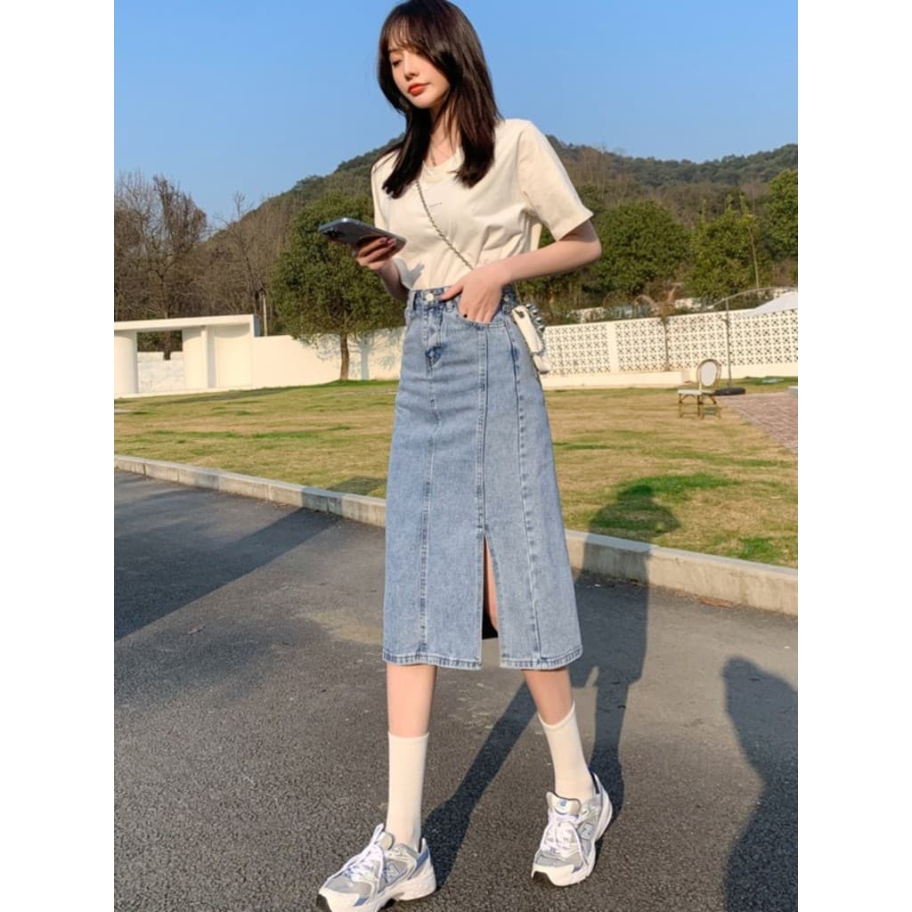 Saia jeans feminina de comprimento médio saia reta 2026 novo estilo primavera verão versão coreana cintura alta fenda a