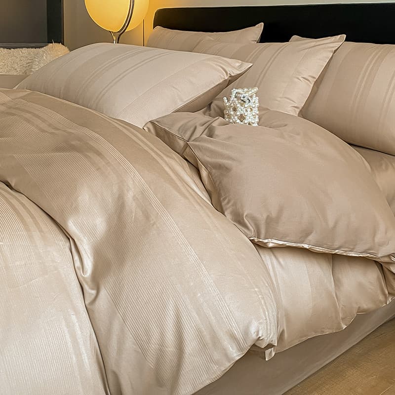 Luz de luxo high-end conjunto de quatro peças 2026 novo estilo 100 algodão puro high-end sentimento cama colcha capa len