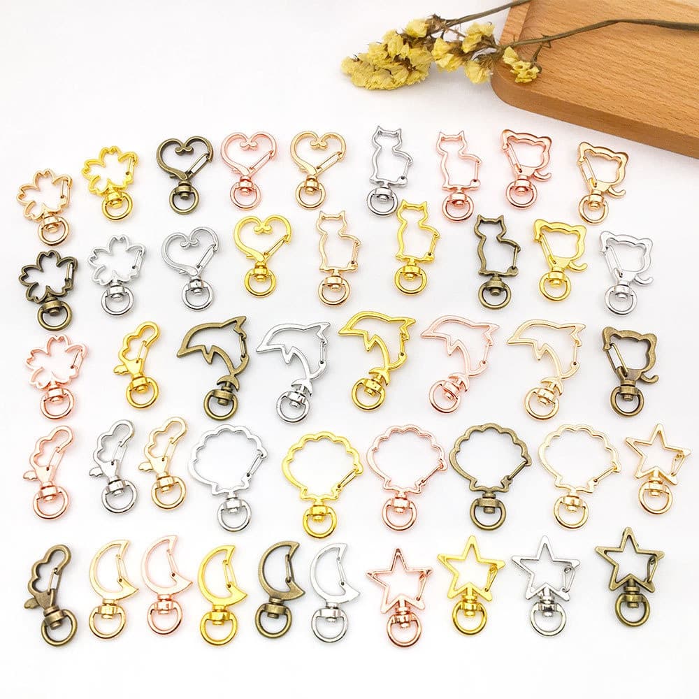Conjunto de 10 chaveiros de resina com formatos de estrela/lua/gato/nuvem/coração/concha IAGY
