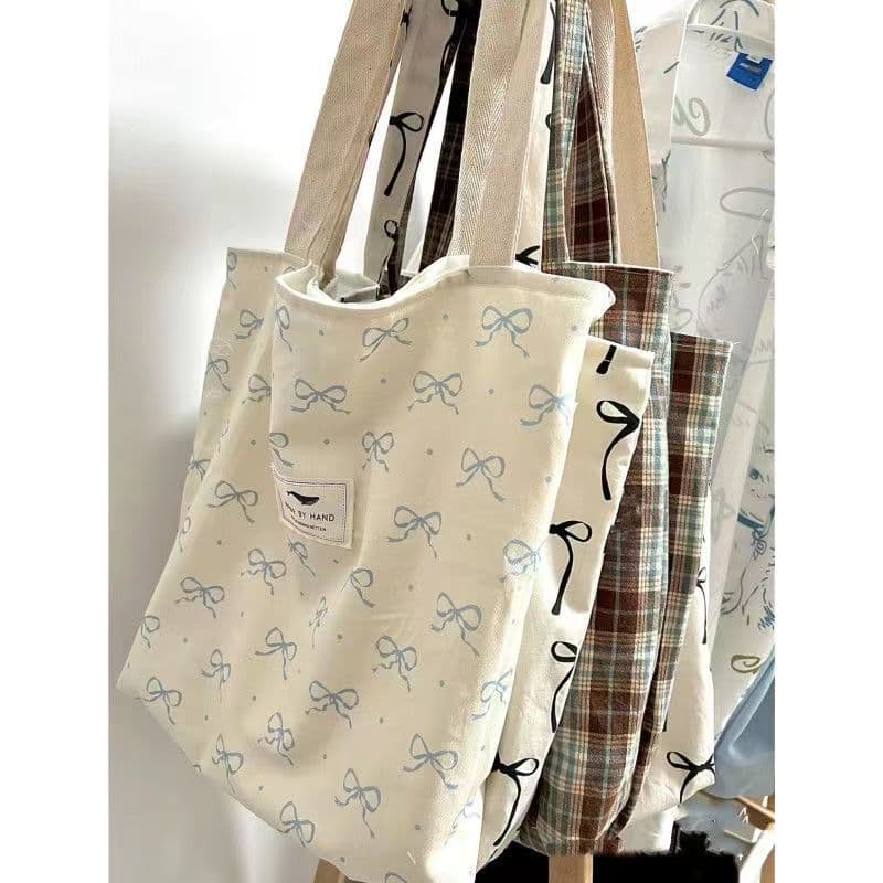 Nova sacola Casual bolsa de ombro versão coreana nicho menina Diagonal saco atacado grande capacidade Commuter moda lona