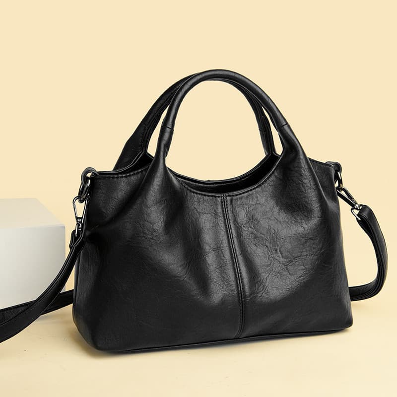 Bolsa feminina 2025 novo estilo de couro genuíno atmosférico moda trabalho Commuter grande capacidade bolsa mãe Cross-bo