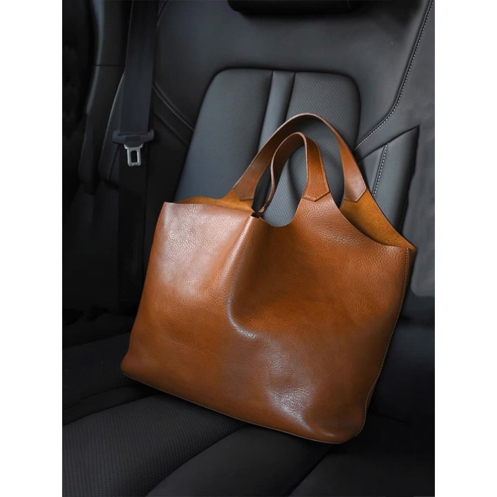 Bolsa Tote de couro macio marrom de grande capacidade feminina 2026 novo estilo luz luxo nicho High-End Tablet PC maleta