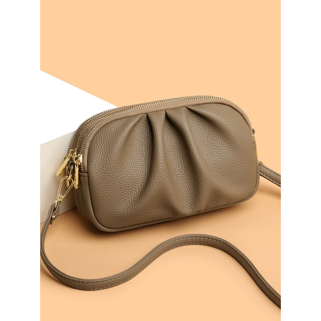 Robo coelho 2026 novo estilo bolsa feminina moda Multi-compartimento saco do mensageiro de um ombro All-Match couro maci