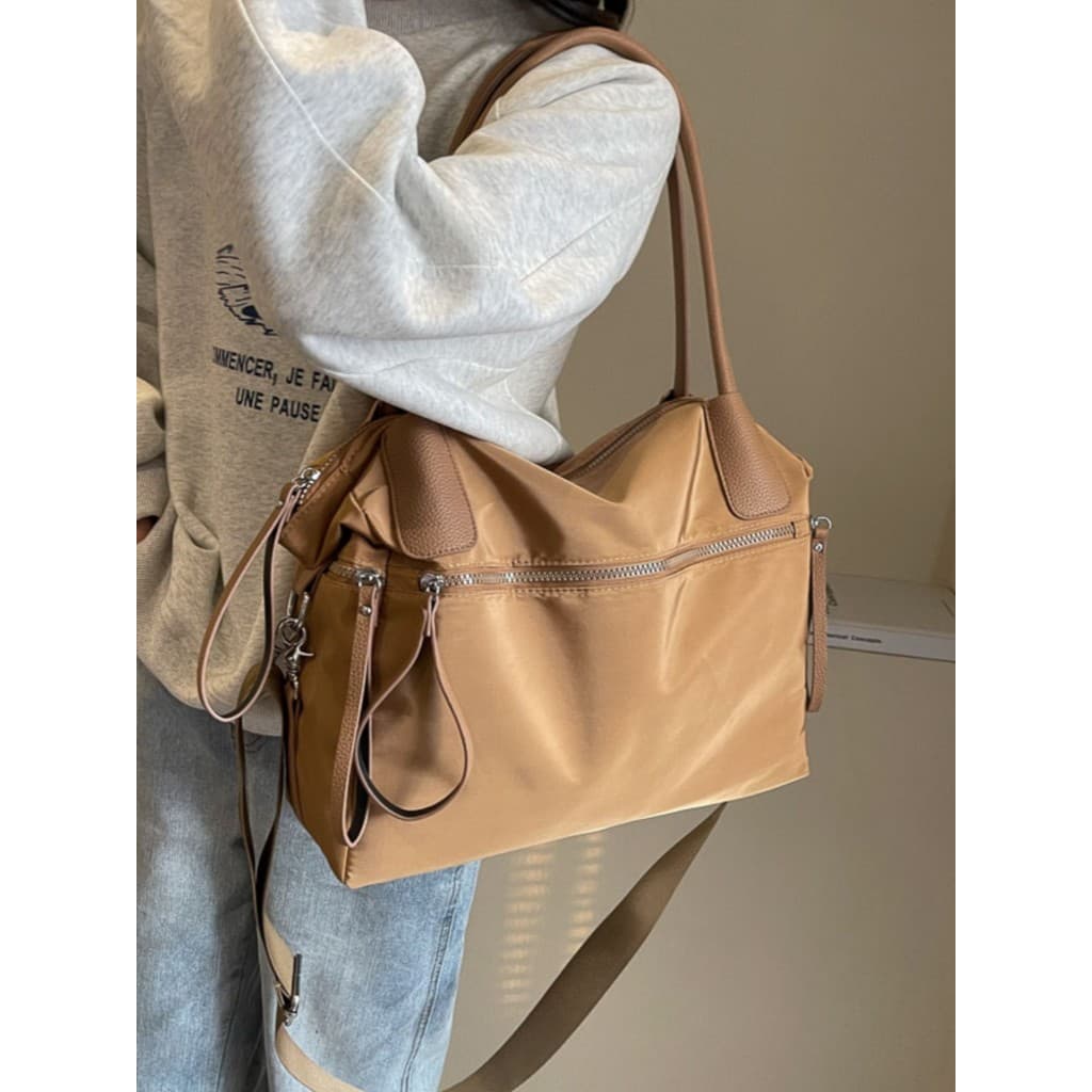 Casual náilon pano grande capacidade saco feminino 2026 novo estilo bolsa de ombro de curta distância pequena bolsa de v