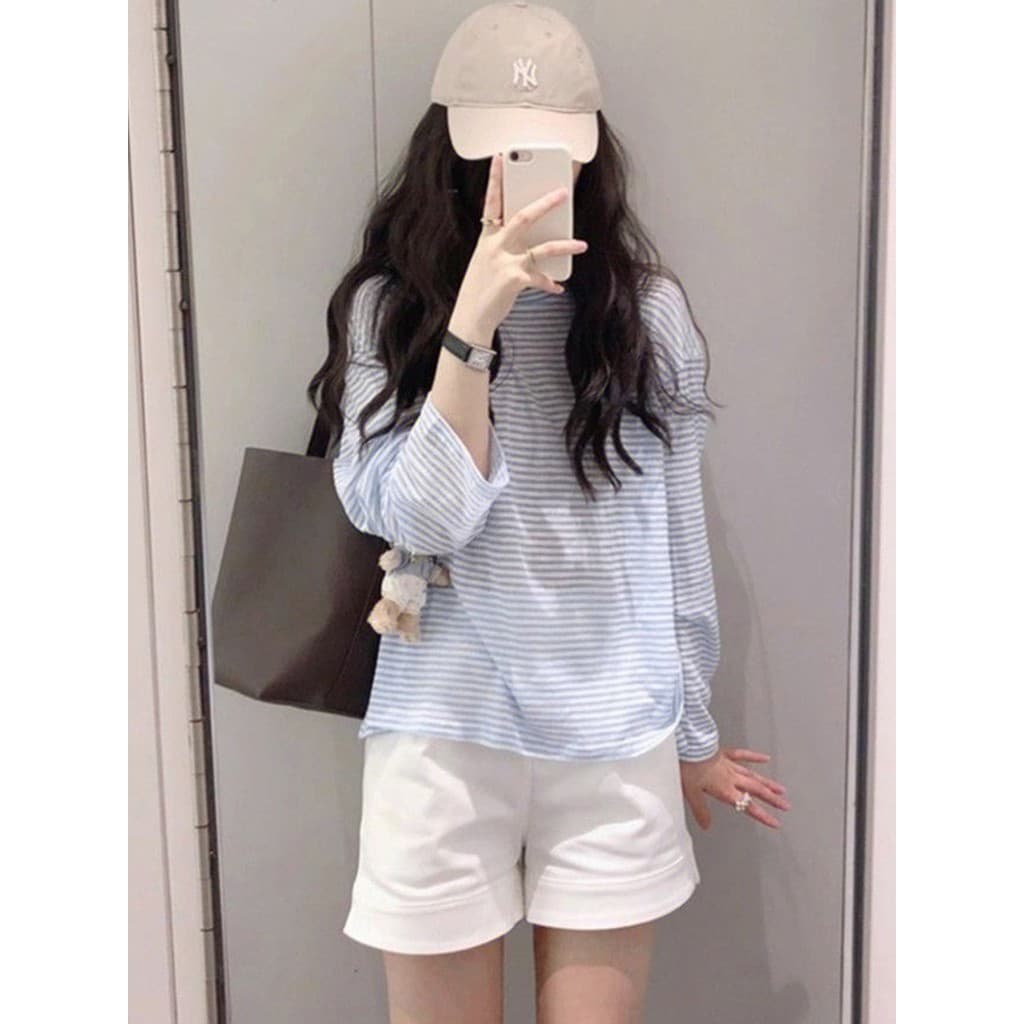Início do outono High-End estilo fino versão coreana estilo preguiçoso camiseta feminina azul listrado de manga comprida