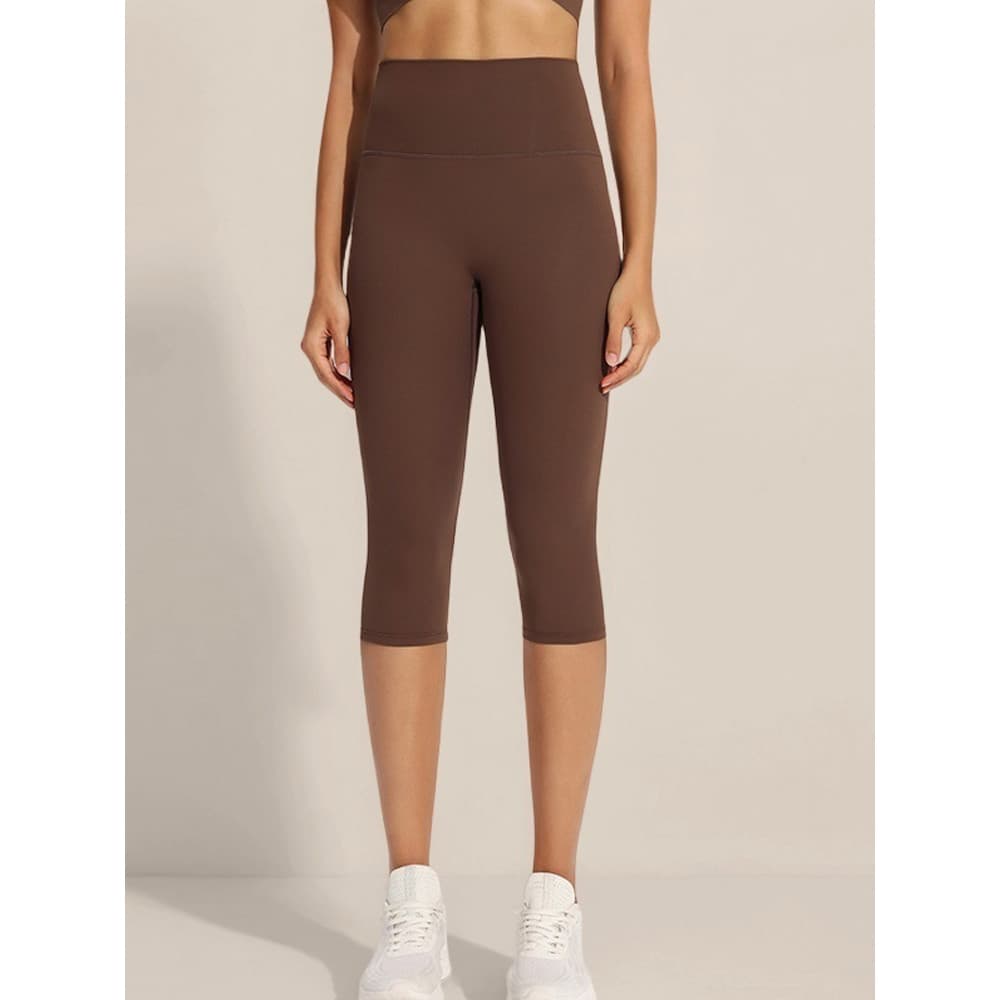 Bolso de cintura traseira sem linha embaraçosa calças cortadas de Fitness feminino de secagem rápida apertado respirável