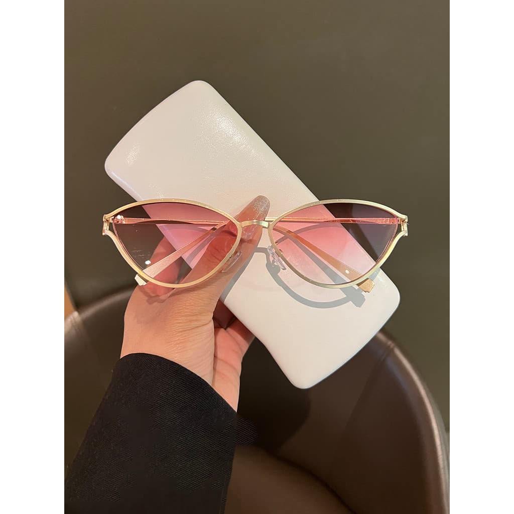 Europeu americano personalidade Metal olho de gato óculos de sol feminino All-Match High-End condução foto forma côncava