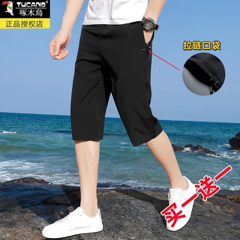 2026 calças cortadas de seda gelo Shorts masculinos pica-pau exterior usar solto esportes praia calças finas calças casu