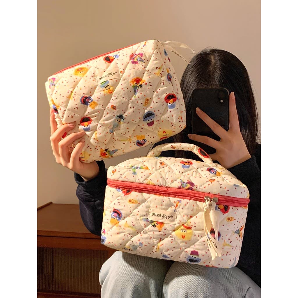 Bonito rua sésamo portátil saco cosmético feminino portátil de grande capacidade cuidados com a pele produto partição sa