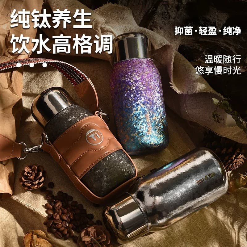Selo de cobre Xixi Copo térmico de titânio puro 2025 Novo estilo Imprensa magnética Saída de água Forro elástico integra