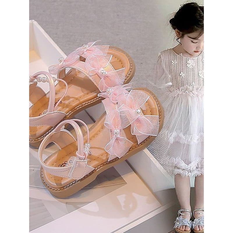 Meninas sandálias 2026 verão novo estilo moda estilo ocidental arco meninas sapatos de princesa sola macia sandálias de