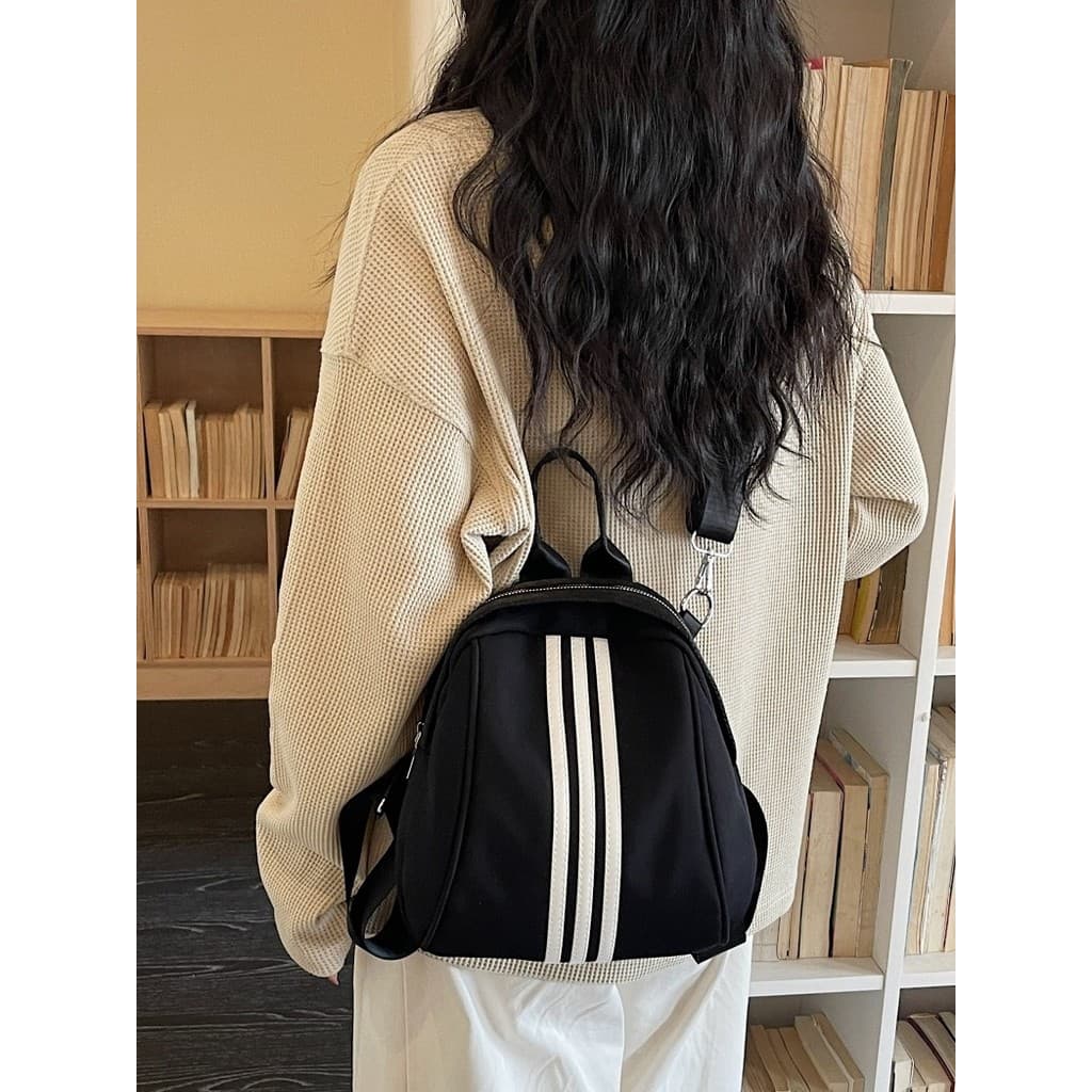 Versão coreana ins estilo mochila feminina moda All-Match listras leve multifuncional Cross-Body mochila Commuter bolsa