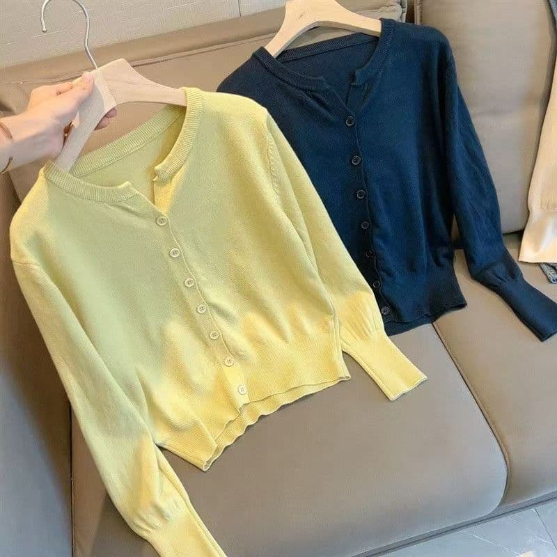Macio ceroso pele-amigável estilo fino venda quente Cardigan de malha feminino versão coreana com decote em V solto esti