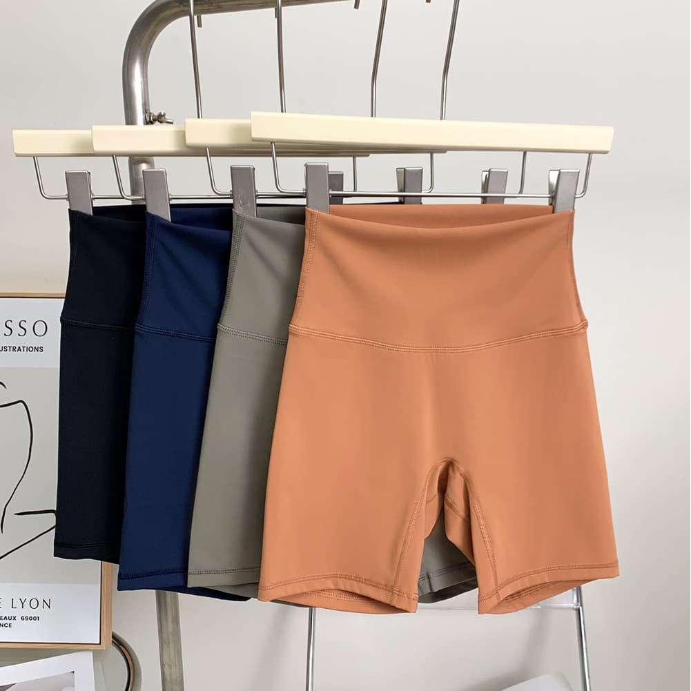 Calças de Yoga de três pontos Hip-lifting confortável sensação nua linha sem constrangimento cintura alta Shorts esporti