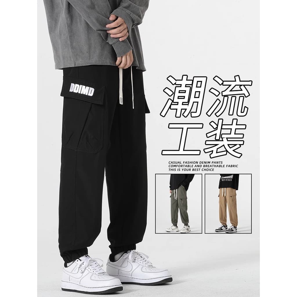 2024 primavera novo estilo na moda macacão masculino solto Harem Multi-bolso esportes casuais calças compridas