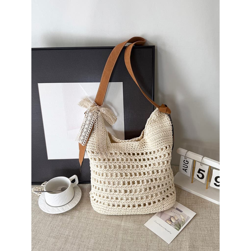 Bolsa de tecido oco de grande capacidade feminina novo estilo All-Match de um ombro à beira-mar férias praia saco tecido