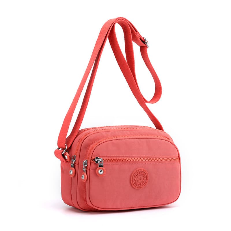 Saco pequeno feminino mensageiro 2026 novo estilo pano de náilon à prova dwaterproof água mãe de meia-idade saco simples