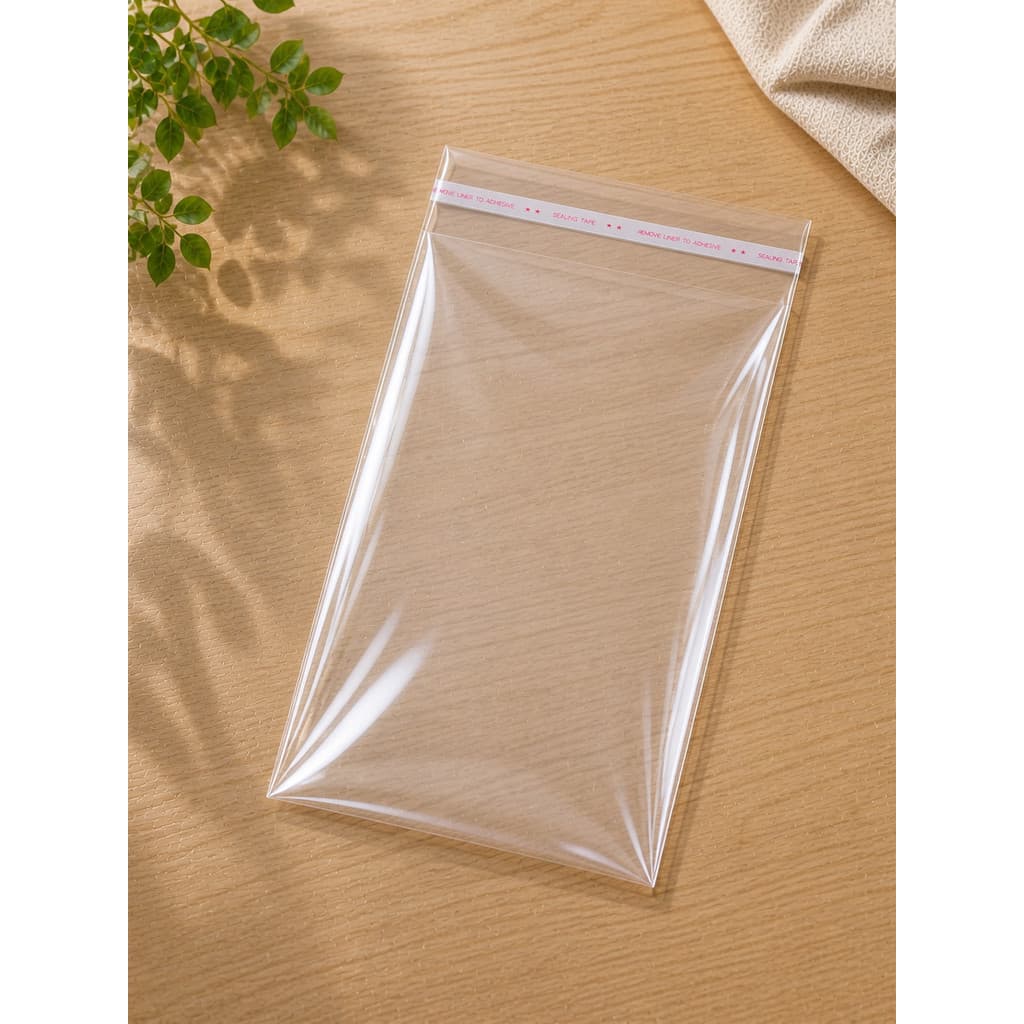 Kit Saco Plástico Transparente Adesivado 25x40