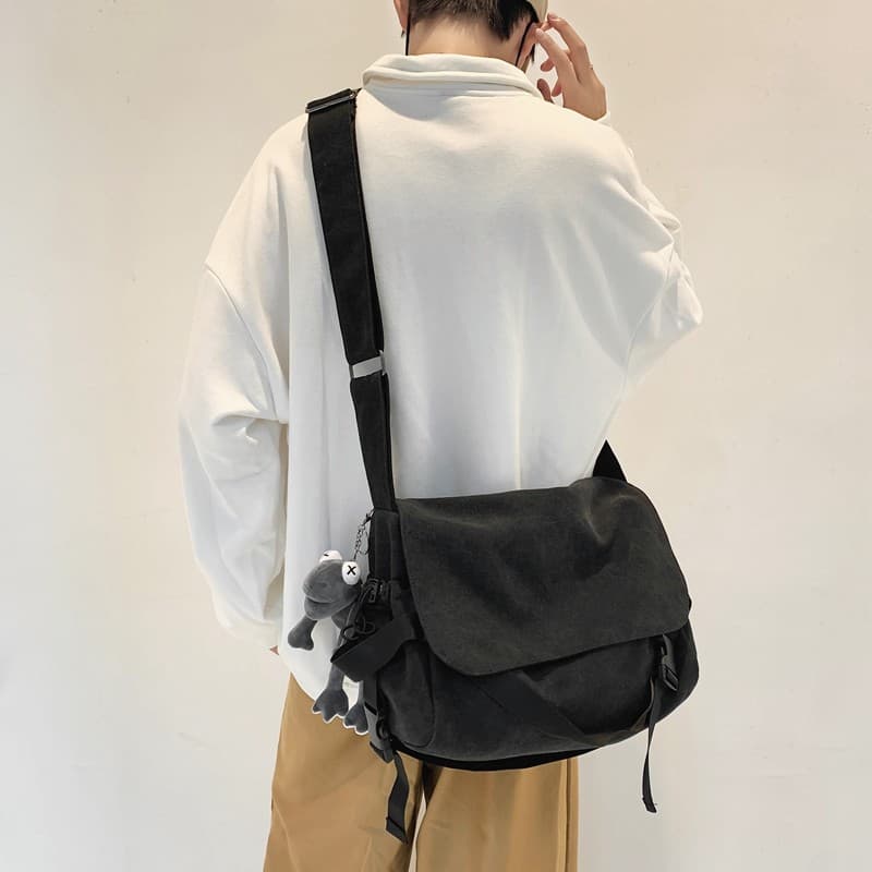 Bolsa mensageiro masculina estilo 2025 novo estilo estudante mochila masculina grande capacidade bolsa mensageiro de lon