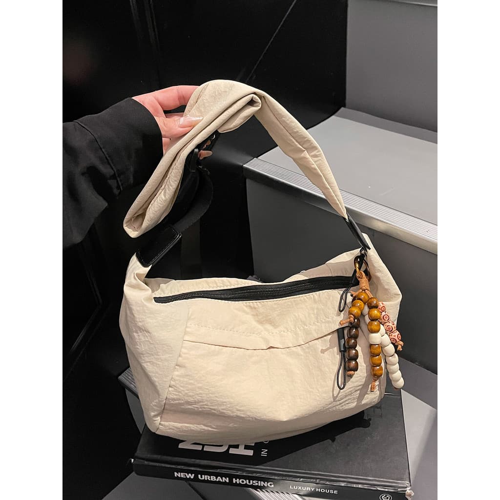 Bolsa de pano de náilon feminina grande capacidade 2026 novo estilo na moda nicho Design de um ombro saco do mensageiro