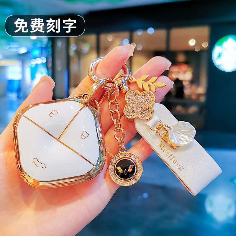 2023 nova capa de chave Baojun KiWiev Yueya nuvem carro Wuling Hongguang mini bolsa céu claro Binguo fivela escudo